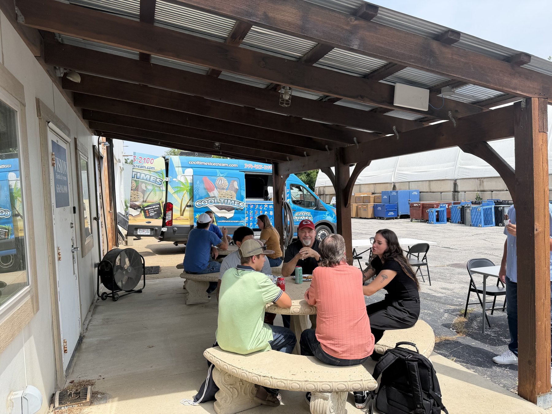VISION employees gathering outside the office for Ice Cream Day