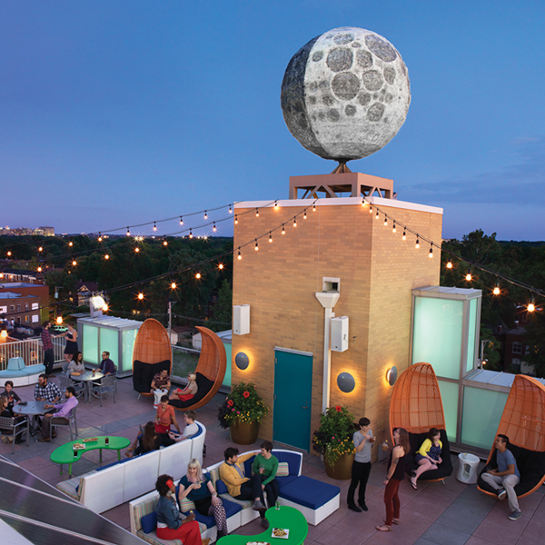 Moonrise Hotel rooftop bar beneath the moon sculpture