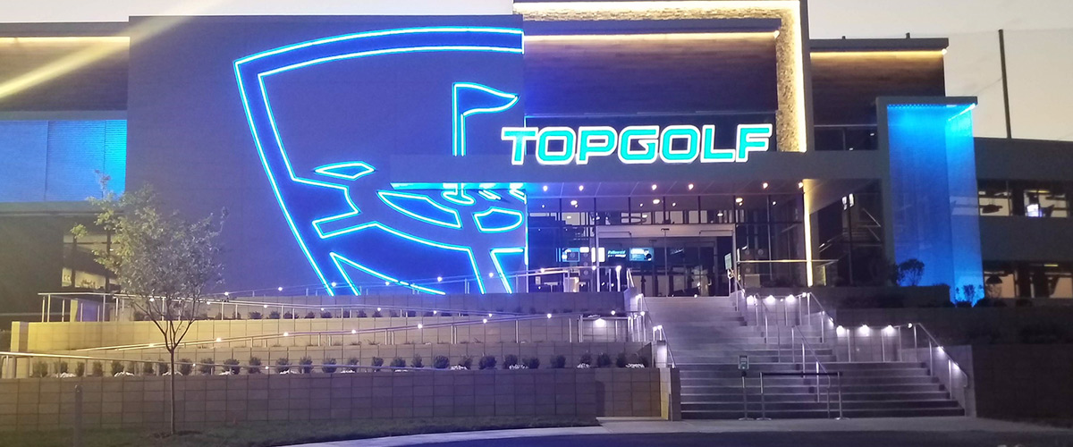 Completed Top Golf Chesterfield entrance illuminated at night